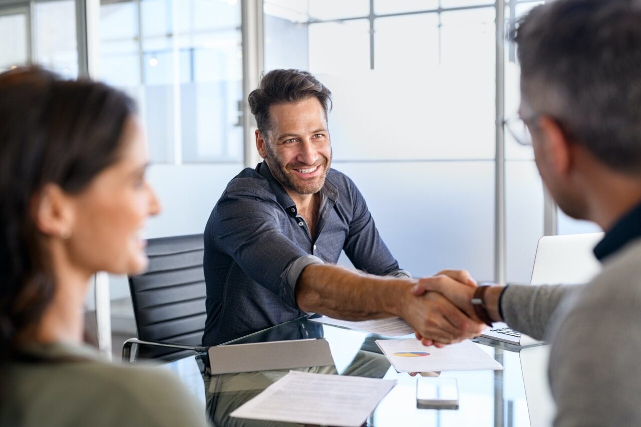 businessman-shaking-hands-with-client.jpg